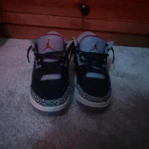 Air Jordan Black and Red Sneakers