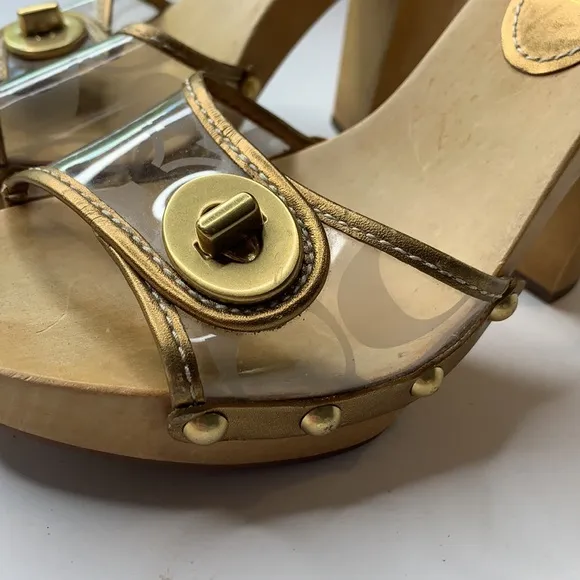 Coach Cagney clear signature gold trim mules