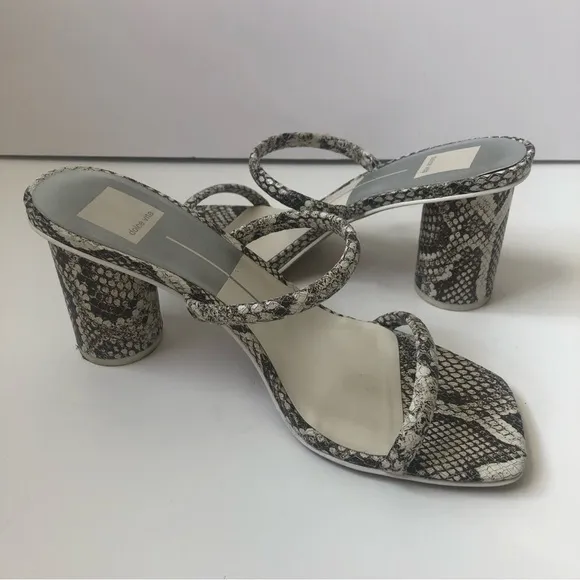 Dolce Vita Noles snakeskin heeled sandals.