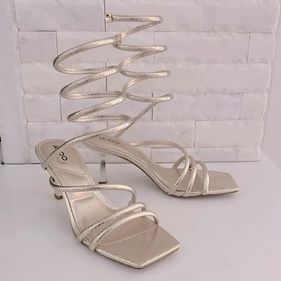 NIB. Aldo Twirly Snake Embossed Ankle Wrap Heeled Sandal in Metallic Gold  7.5